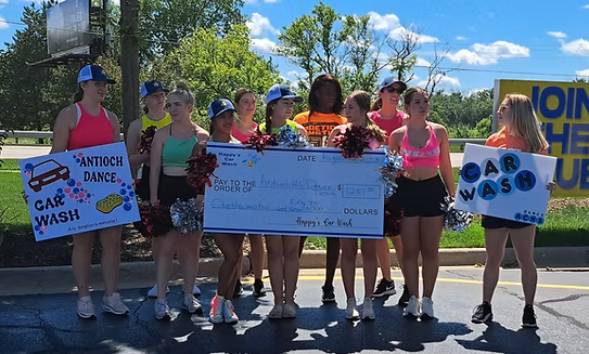 Team celebrating fundraiser